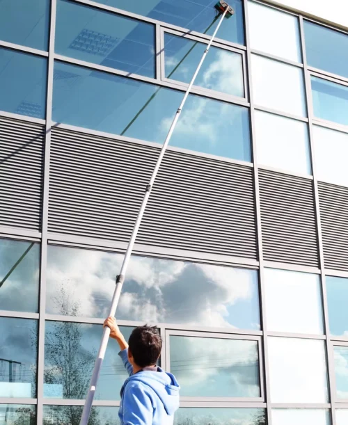 Clearvision crew cleaning tall Nashville building windows